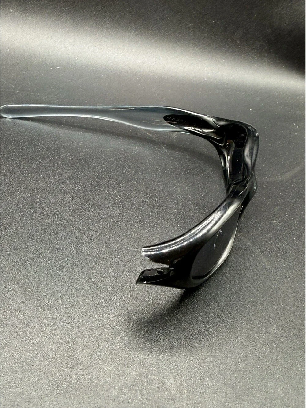 Oakley Pocket Polished Black/Black Iridium Lenses (Missing Right Arm)